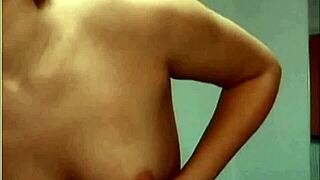 Cute brunette engages in live web chat on nudecamroulette.com.