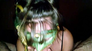 check out this milf in green mask sucking thick cock 😍