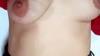 spanking my natural tits with a belt in play