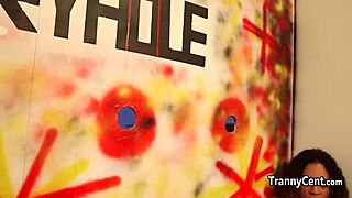 Skinny transsexual tgirl in crossdressing plays with multiple cocks