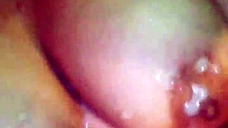 Whorella DeVille showcases her big natural tits in an interracial cumshot video.