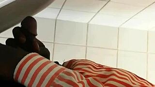 check out this black gay guy stroking at the urinal! 😏