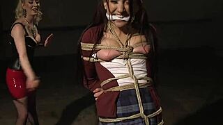 Shackled Lesbian Crawls With Butt Plug In Kinky Bondage Assfucking.