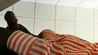 check out this black gay guy stroking at the urinal! 😏