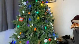 Horny girl masturbates big clit on Christmas