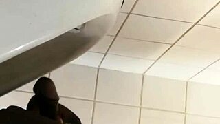 check out this black gay guy stroking at the urinal! 😏