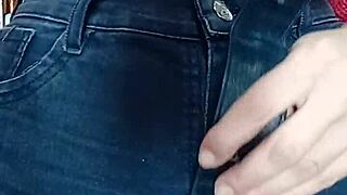 Playing with a belt in a spanking session