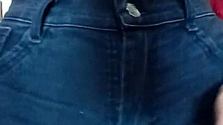 Playing with a belt in a spanking session