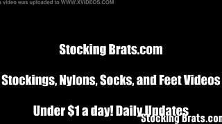 Watching Holly take off her fishnet stockings for teasing footjob