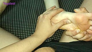 Beautiful petite foot craves a sensual close-up massage touch.