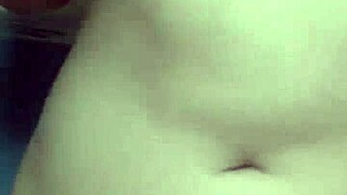 Young Asian Woman Enjoys Solo Fingering Session