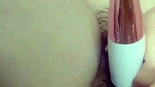 Young Asian Woman Enjoys Solo Fingering Session