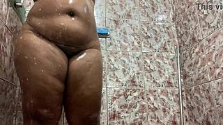 i secretly filmed the brunette in the shower with her shaved pussy