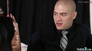 Busty milf Jaclyn Taylor rides a monster cock while her husband rests nearby in bed.