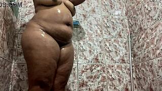 i secretly filmed the brunette in the shower with her shaved pussy