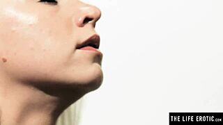 hot blonde in lingerie fondles big tits while masturbating