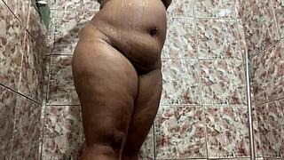 i secretly filmed the brunette in the shower with her shaved pussy