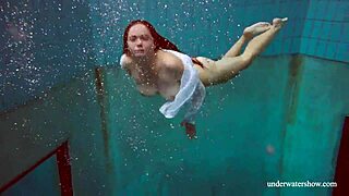 Big tits redhead lola underwater nude with friend