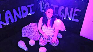 Cute milf Kandi Laigne pops balloons in fetish play