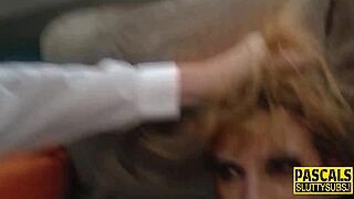 Busty girl suffocates on a large dick in BDSM fucking