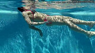 Nicole Pearl looks super hot, shaking her ass in the pool. So horny today!