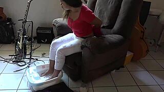 Asian girl gives foot spa