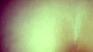 the newlywed couple shares a private moment in their homemade wedding video