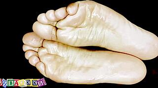 Getting a wet and oily foot massage feels so good.