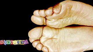 Getting a wet and oily foot massage feels so good.