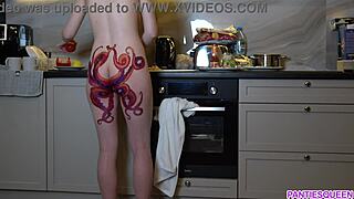Naked housewife with octopus tattoo on ass cooks dinner in kitchen and ignores you
