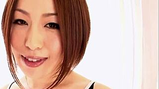 asian hottie teases the camera with her cock sucking skills