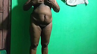 yo, check this indian milf getting freaky with an umbrella!