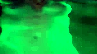 Perfect brunette enjoys outdoor bath.