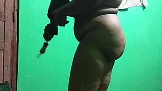 yo, check this indian milf getting freaky with an umbrella!