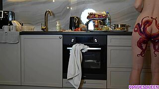 Naked housewife with octopus tattoo on ass cooks dinner in kitchen and ignores you