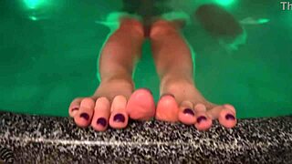 Perfect brunette enjoys outdoor bath.