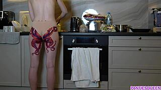 Naked housewife with octopus tattoo on ass cooks dinner in kitchen and ignores you