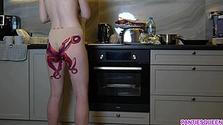 Naked housewife with octopus tattoo on ass cooks dinner in kitchen and ignores you