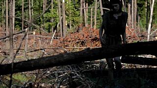 Hey, watch this naked girl touching herself in the forest, so hot!