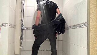 The Master In Blue Jeans Washes Barefoot In The Wet Bath