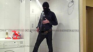 The Master In Blue Jeans Washes Barefoot In The Wet Bath