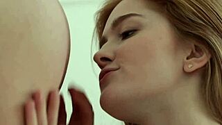 stunning redhead and cute blonde try on lingerie then eat each other's pussies.