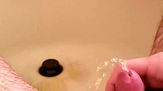 golden shower dripping over my shaved little cock now