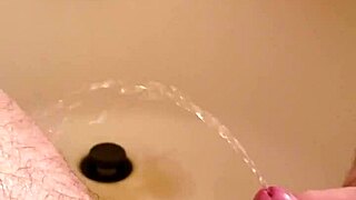 golden shower dripping over my shaved little cock now