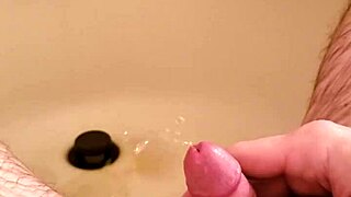 golden shower dripping over my shaved little cock now