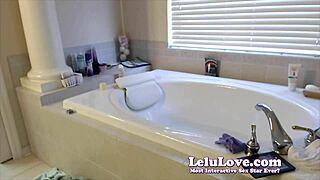 Lelu Love: a naked brunette proposing a hot scene in a pool and bathtub