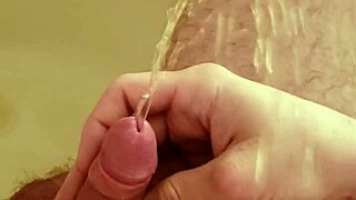 golden shower dripping over my shaved little cock now