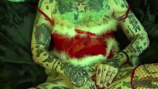 Milf celebrates Christmas with solo fingering orgasm at home