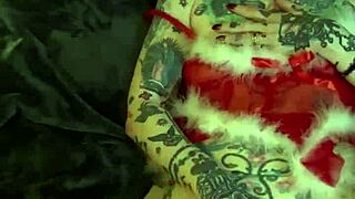 Milf celebrates Christmas with solo fingering orgasm at home