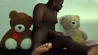 enjoying a playful threesome with brown and caucasian furry toy bears
